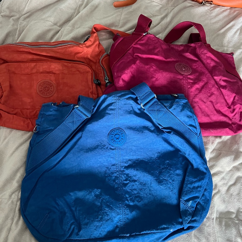 Kipling Women's Tote Bags in Blue, Pink, and Orange